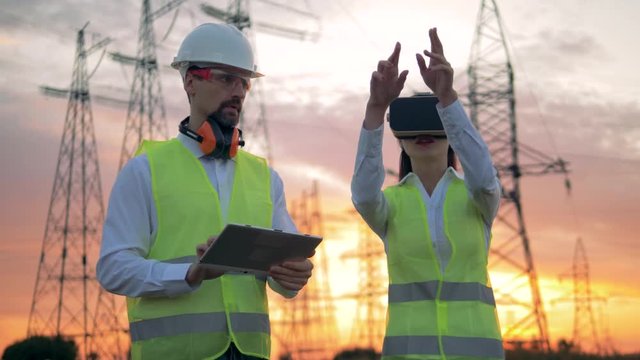 Female Engineer Wearing VR Headset managing construction project.