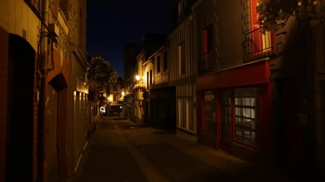 Medieval Europe - narrow street in France at night