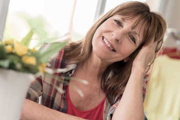 Fototapeta premium Portrait of smiling mature woman