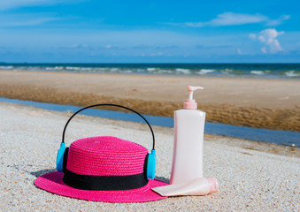 Sunscreen, hat On the beach in summer.