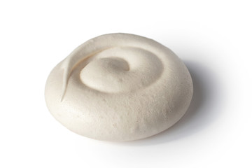 White swirl shaped meringue isolated on white.