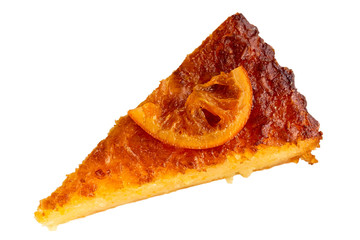 A piece of traditional greek orange cake isolated on white from above.