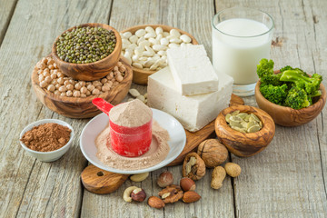 Selection vegan protein sources on wood background