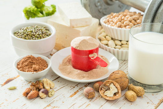 Selection vegan protein sources on wood background