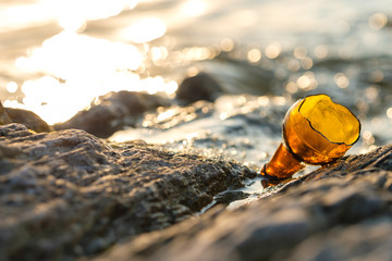 Broken bottle on the beach