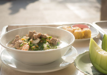 boiled rice in soup blow with shrimp and pork. Asia traditional food