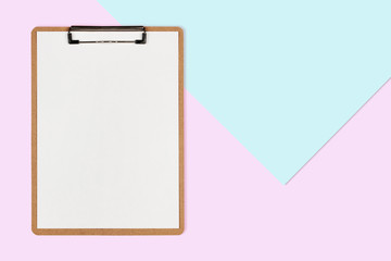 Clipboard with white sheet on pastel color background, Minimal concept