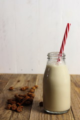 Traditional Spanish horchata made of tiger nuts, non-dairy milk, in a glass bottle, copy space