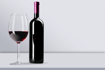 Red Wine in Bottle and Glass on white background