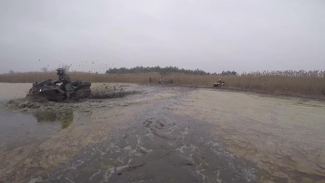 ATV Ride  through the Swamp, Water, Dirt and the Terrain - GoPro cam - back view