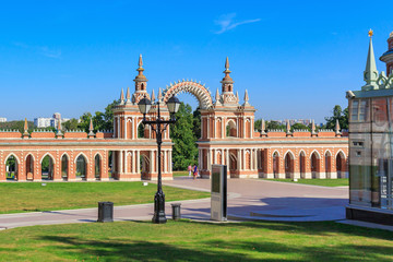 Entrance with arch in Great Palace museum in Museum-reserve Tsaritsyno in Moscow at sunny summer...