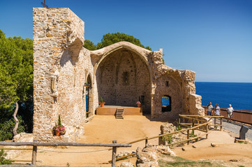 Sunny view of fortress Tossa de Mar at the coast of  Mediterranean sea, Girona province, Spain.