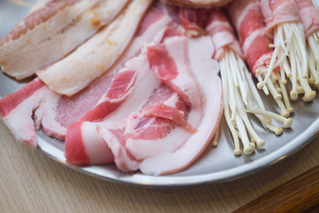 Raw fresh meat and enoki mushroom