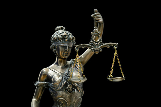 Themis or Lady Justice (Symbol of Justice) isolated on black background with clipping path