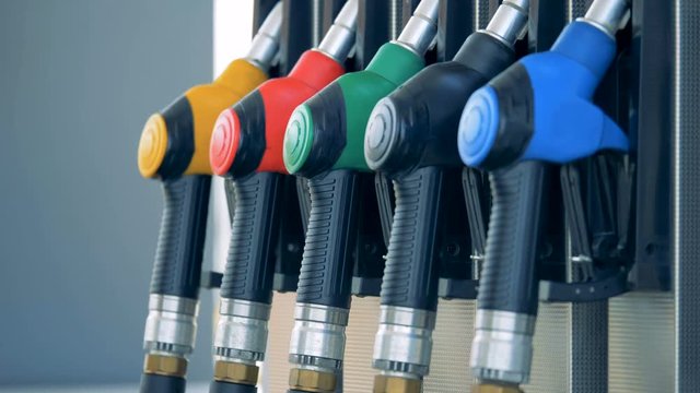 Refilling equipment at a gas station, close up. Filling station, petrol station, fuel station, gasoline station, refueling station