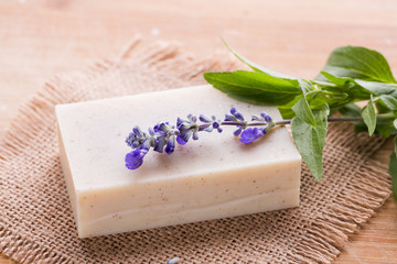 Obraz na płótnie Canvas Handmade lavender soap with lavender flowers