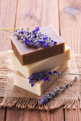 Obraz na płótnie Canvas Handmade soap bars with lavender flowers, Closeup