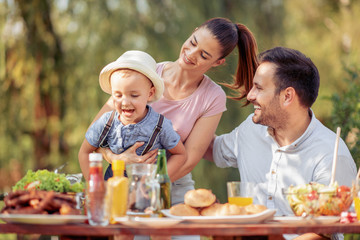 Family having lunch outdoors