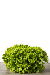 Lettuce Salad. Organic food. The background is white. Macro. Copy space. Vertical shot.