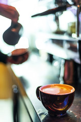 Fototapeta na wymiar making espresso coffee close up detail with modern machine