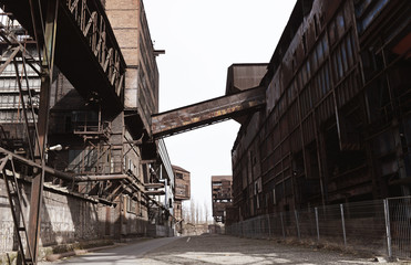 Old industrial area with  coal mine, coke ovens and blast furnace operations. - obrazy, fototapety, plakaty