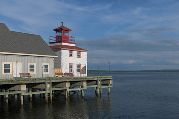Historical lighthouse on old pier in Pictou, Nova Scotia © gnagel