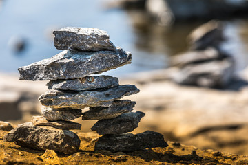 Inukshuk by the river edge.