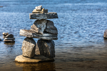 Inukshuk by the river edge.