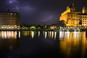 Obraz premium Harbor Buildings And Lightning