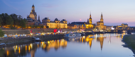 Fototapeta na wymiar panorama of river side and night city in Dresden in Germany
