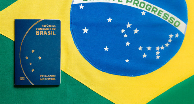 Brazilian Passport on Brazilian flag background - republica federativa do Brasil, mercosul