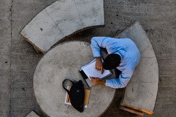 man sitting seen from above