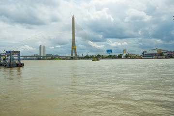 Fototapeta premium Boat for tourist crossing the river on a Saturday.