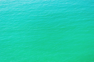 sea turquoise water surface, top view.