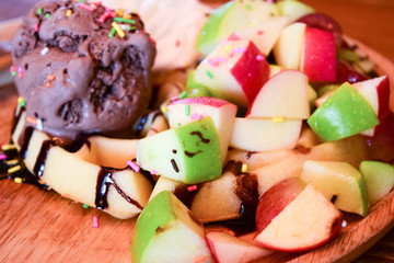 Chocolate Ice Cream with fresh fruit on wafer, sweet dessert , fat