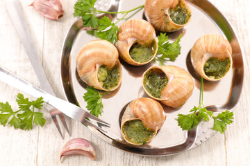 french dish, escargot with butter and parsley