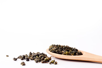 Dry tea in wooden spoons,Dry oolong tea for healthy