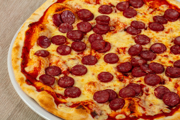 Pizza with sausages