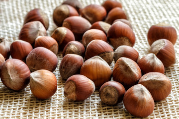 whole hazelnuts on the background of a wooden table