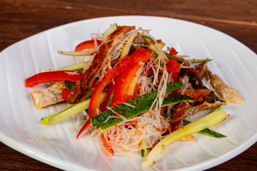 Asian salad with salmon skin