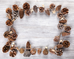 pine cone background with wooden background