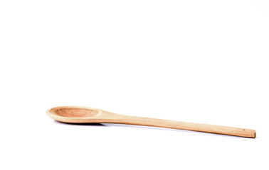 Hand holding wooden turner, cooking time