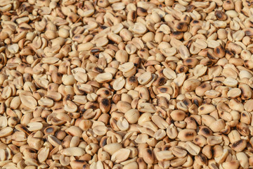Close up of fried peeled  peanuts.