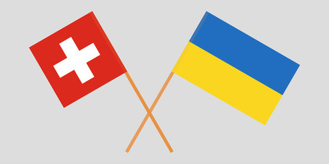 Crossed flags Ukraine and Switzerland. Official colors. Correct proportion. Vector