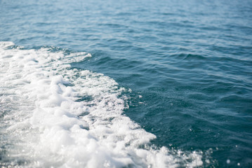 Blue water waves and water bubbles.