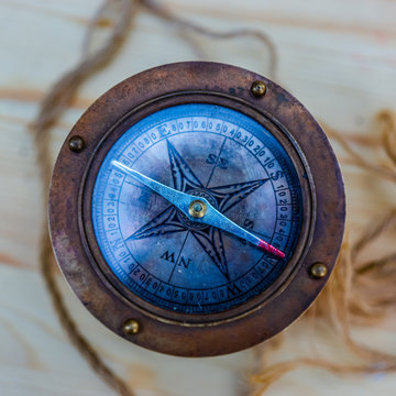 Ancient nautical compass viewed from above