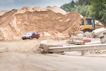 Heavy machinery equipment at road construction site