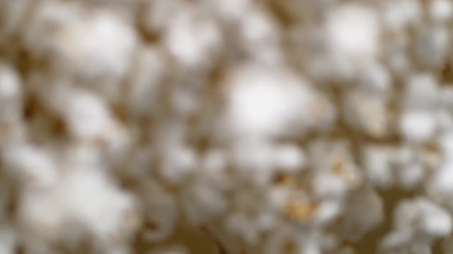 Camera follows popcorn jumping. Shot with high speed camera, phantom flex 4K. Slow Motion.