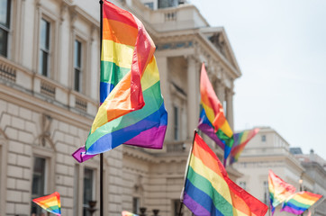 Rainbow flags on LGBT London Pride parade .