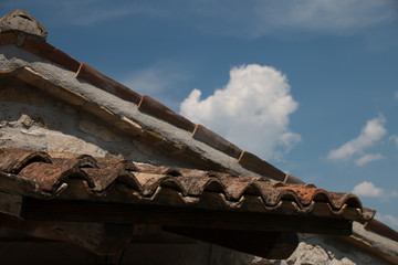 Fototapeta na wymiar Hum, Croatia - July 29, 2018: View of a stone roof in the town of Hum in Croatia. Hum is known as the smallest city in the world.